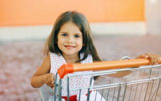 Girl in Shopping Cart